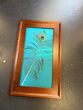 Framed peacock feather
