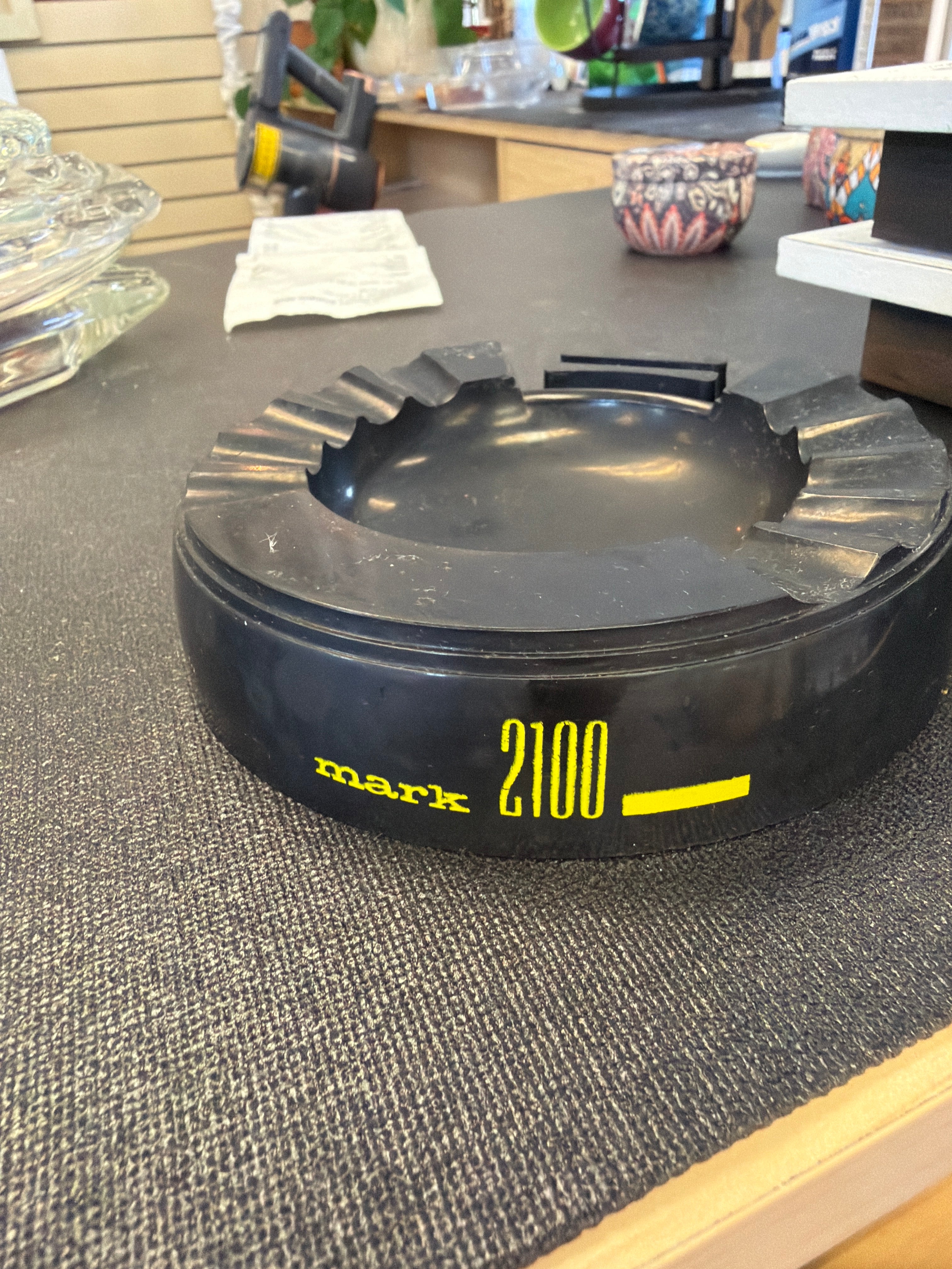 "Mark 2100" was also the name of a well-known hotel and restaurant in Fort Lauderdale, Florida, this specific ashtray is a collectible piece of mid-century or retro