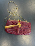 Judith Leiber snakeskin bag