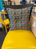 Lush Decor Boho Stripe reversible decorative pillow featuring a turquoise and tangerine geometric pattern.