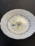 Blue Peony Bowl, featuring a central floral bouquet and scalloped edges