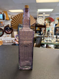 Purple Giralda-style bottle