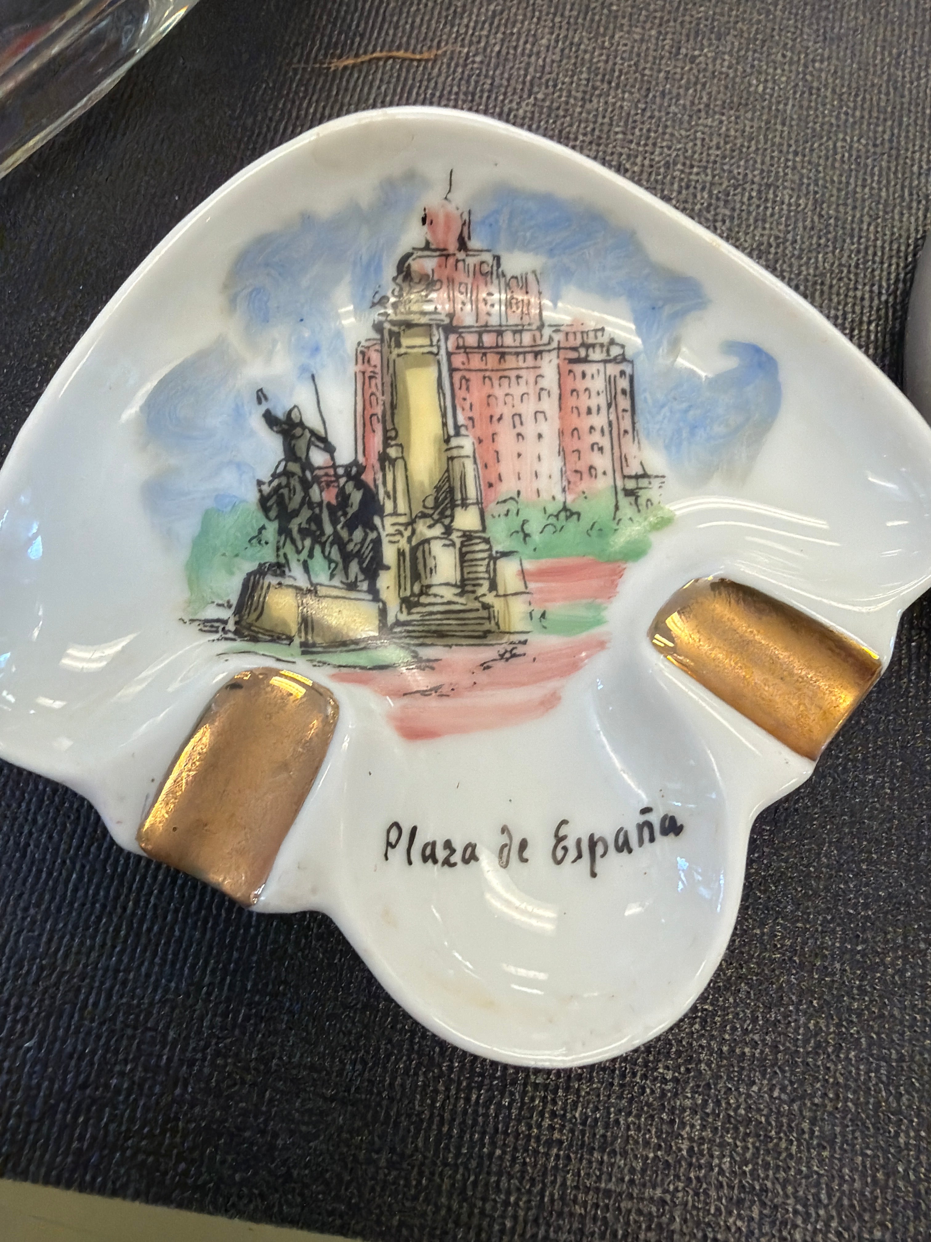 ceramic "Plaza de España" souvenir ashtray from Spain featuring a scalloped edge and gold-toned cigarette rests