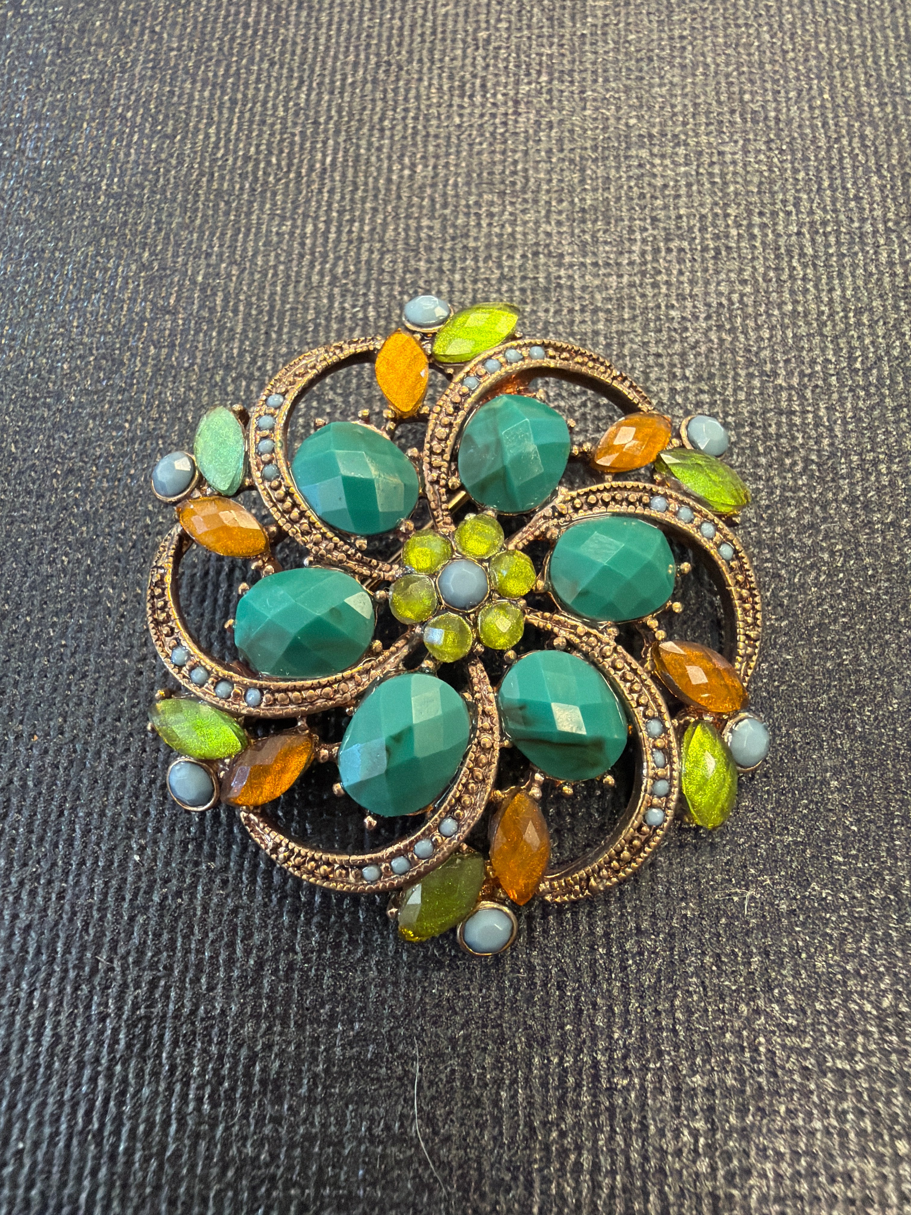Green floral brooch
