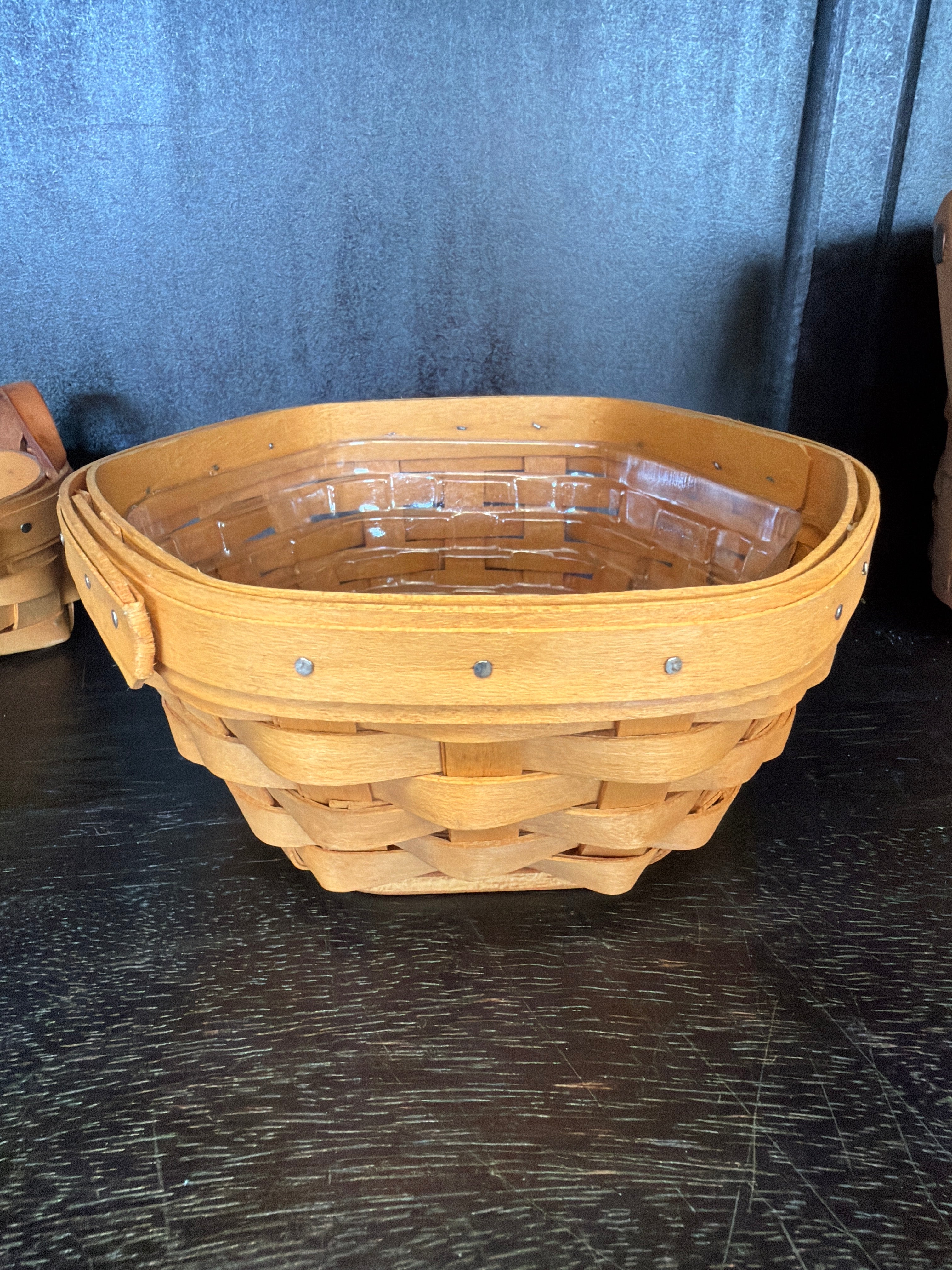 Longaberger Generations Basket, a collectible handwoven wood basket featuring a hexagonal shape and a plastic protector