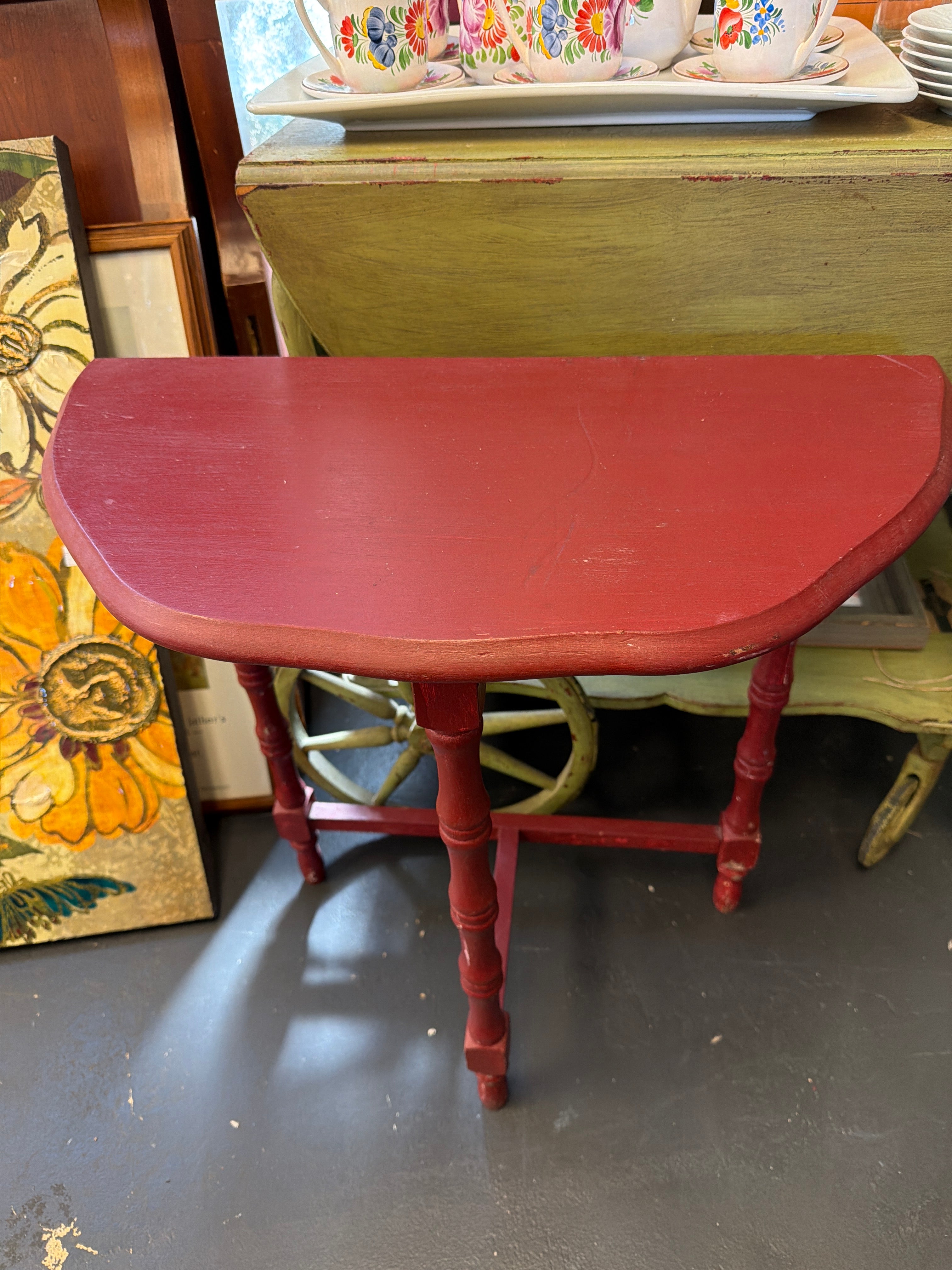 Vintage red half-moon console table