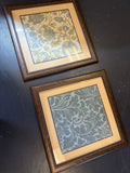 Pair framed fabric art