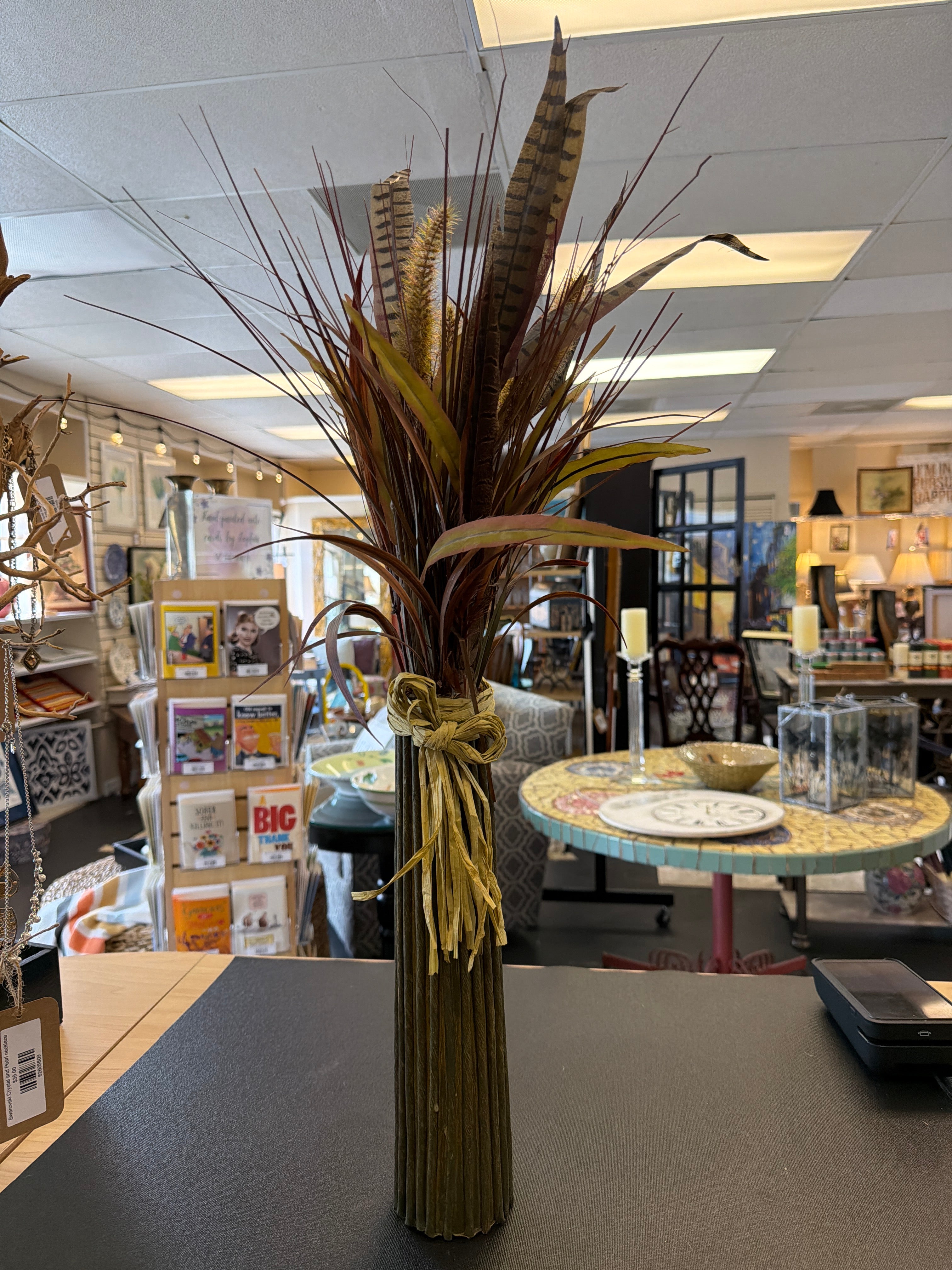 Grass and feather arrangement