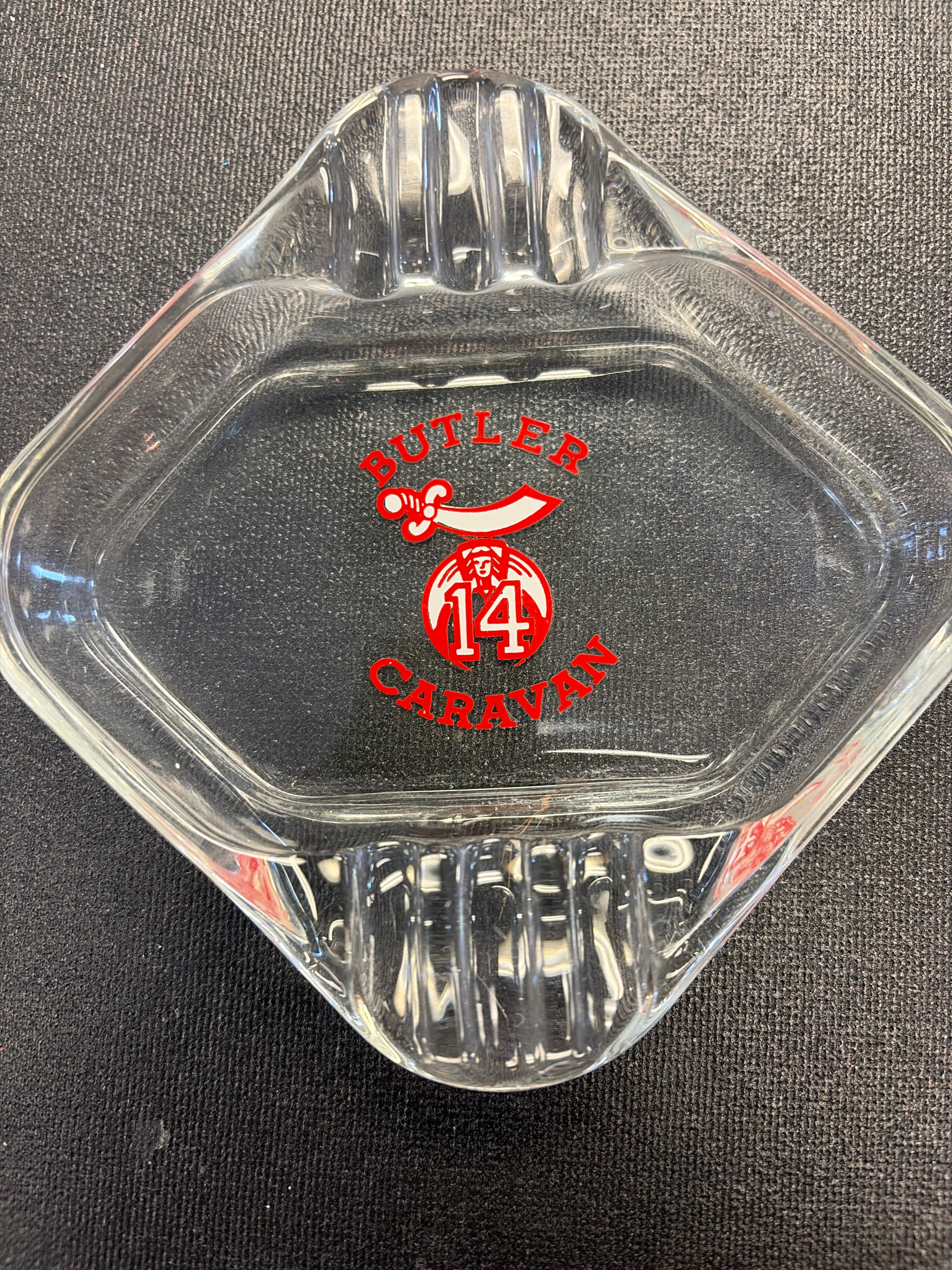 Vintage glass ashtray featuring the logo for Butler Caravan #14, a Shriners social club based in Butler, Pennsylvania.
