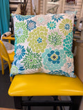 Throw pillow in shades of green, blue and turquoise flowers