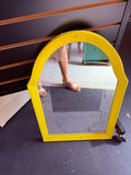 Yellow wall mirror