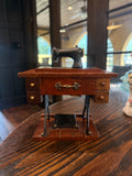 George Good Corporation sewing machine music box